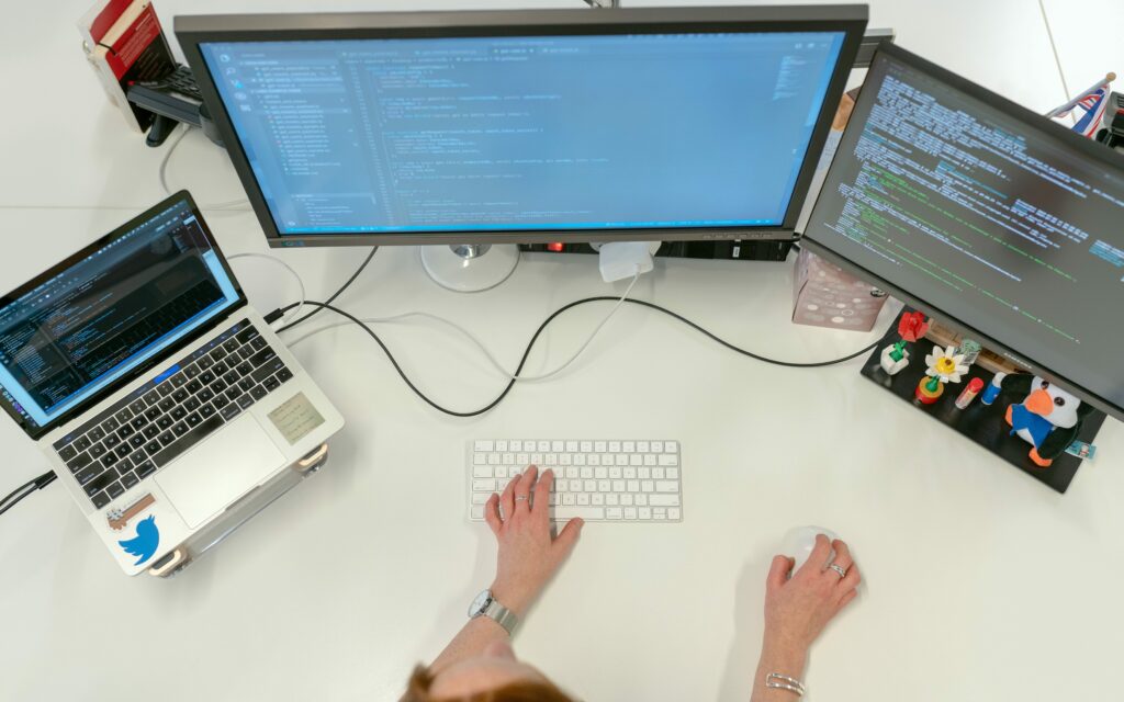 Person at desk programming